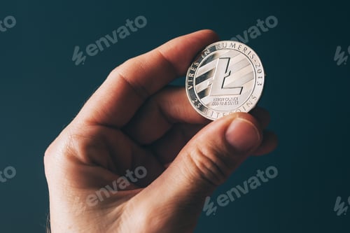 Preview: Litecoin cryptocurrency in hand