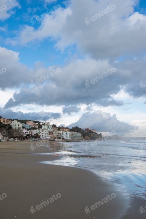 Preview: Ancient buildings on hill over coastline on cloudy day, Anzio, Italy