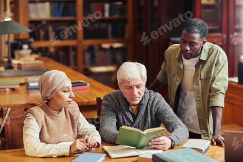 Preview: People Studying in Library
