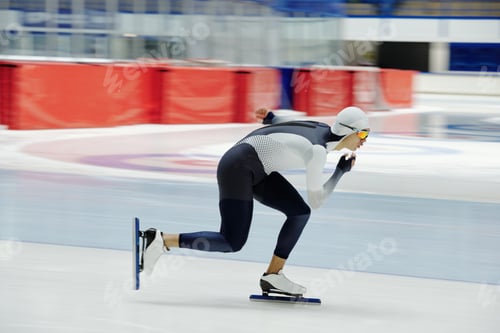 Preview: Side view of fast motion of young sportsman bending and sliding forwards