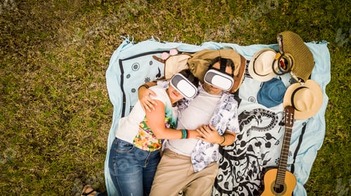 Preview: Alternative couple in relationship lay down i love with guitar and goggled headset