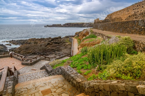 Preview: Stone pathway descends towards the rocky shoreline at Costa de El Sauzal, Tenerife