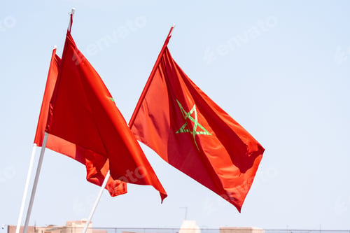 Preview: Closeup view of numerous Moroccan flags blowing in the wind in Marrakesh, Morocco,