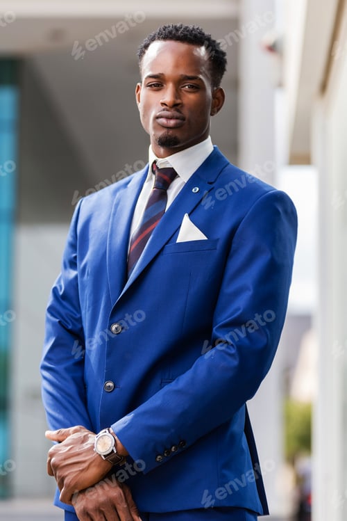Preview: Outdoor standing portrait of a black African American business m