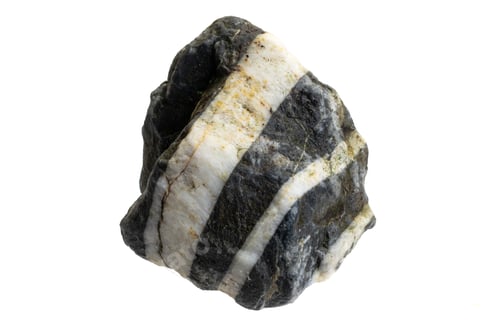 Preview: black stone with white quartz stripes against white isolated background