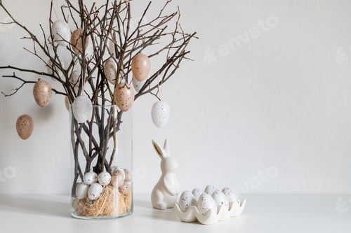 Preview: Easter basket with pastel eggs and spring tree decor