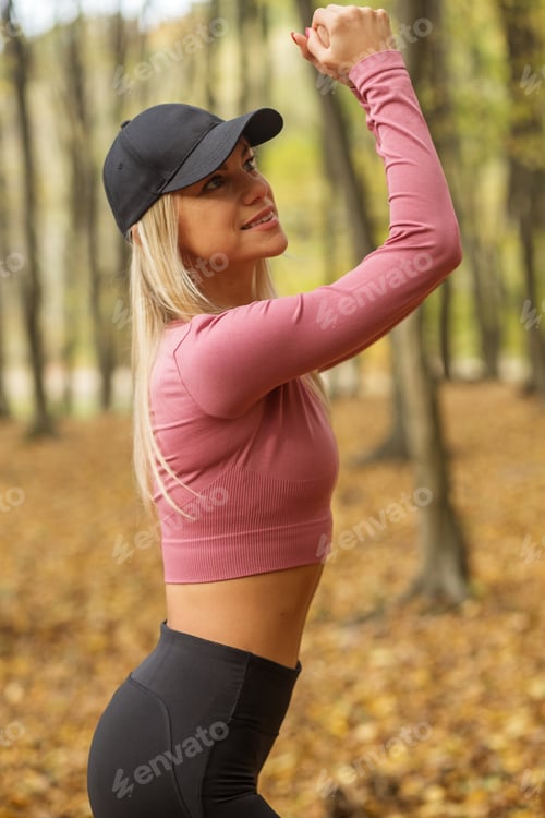 Preview: Woman goes in for sports outdoors. Concept of sports and healthy lifestyle. Autumn season.