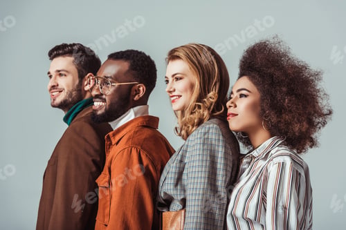 Preview: side view of happy multicultural retro styled friends looking away isolated on grey