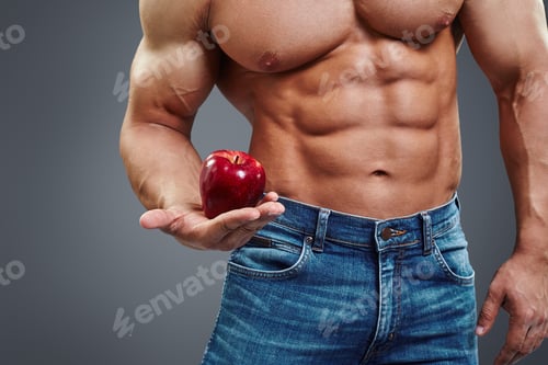 Preview: Strong Muscle Man holding a Red Apple