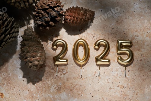 Preview: Decorative natural arrangement with golden candles marking the arrival of 2025