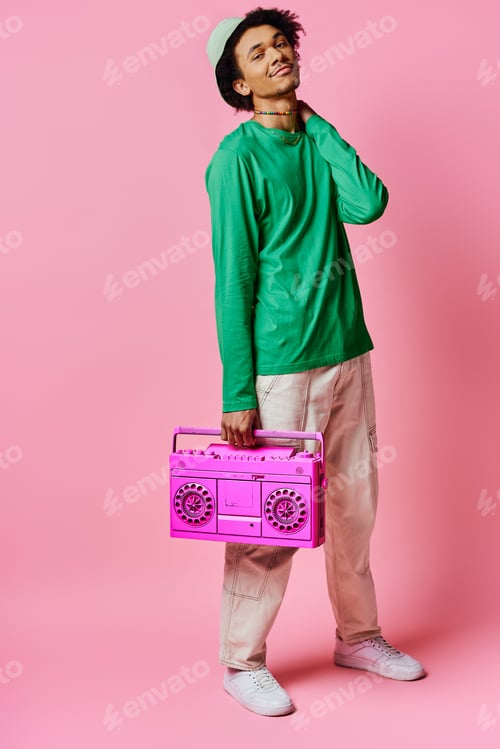 Preview: Vibrant melodies: man in green shirt with pink radio
