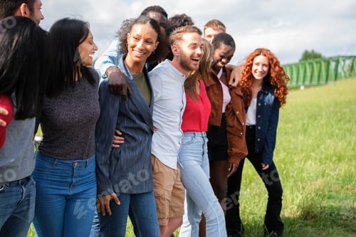Preview: Group of young people together in the park having fun outdoors