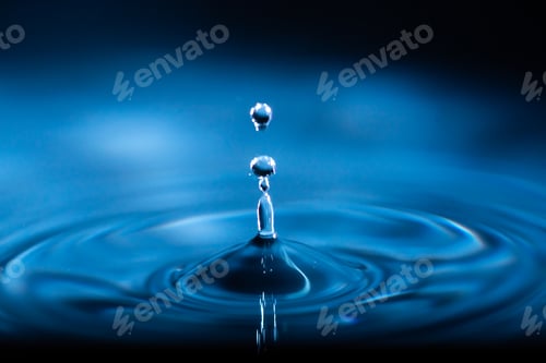 Preview: abstract background of blue water splash falling drop on liquid wave