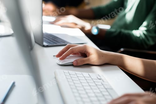 Preview: Close up of people's hand working on computer