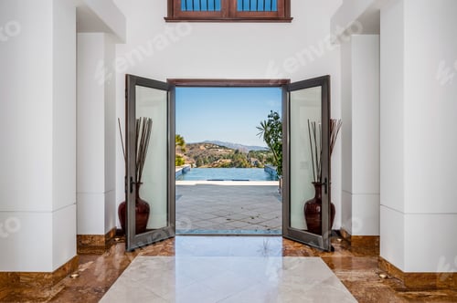 Preview: the door is open to view the swimming pool from the hallway