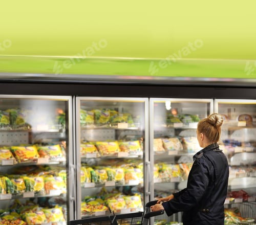 Preview: Woman Choosing Frozen Food From A Supermarket Freezer