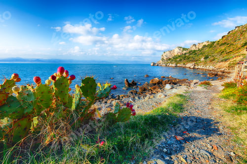 Preview: Dramatic spring sunset on the the cape Milazzo panorama of nature reserve Piscina di Venere.