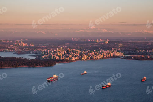 Preview: Aerial view of a modern Downtown City during a sunny winter sunset
