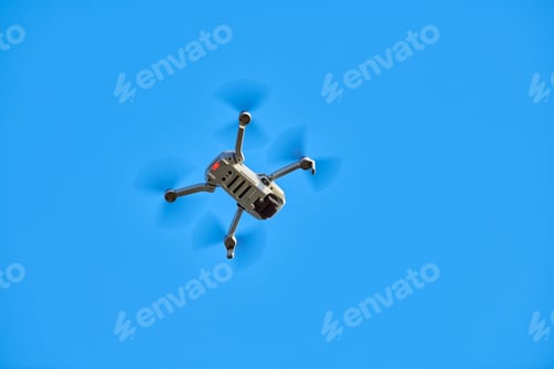 Preview: Quadcopter drone in sky