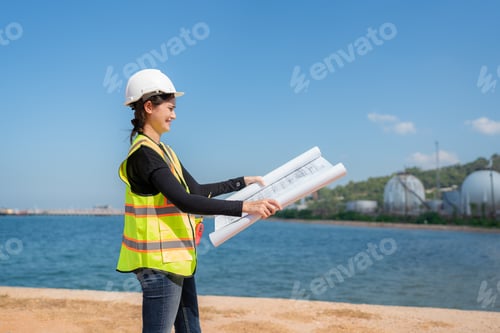 Preview: Mechanical engineer checking gas pipeline system new construction project.