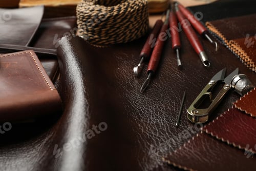 Preview: Leather samples and tools as background, closeup