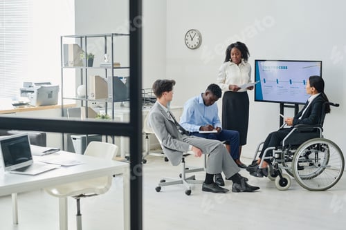 Preview: Business people having presentation at office