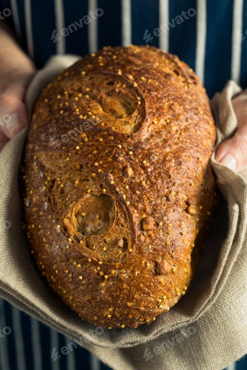 Preview: Handmade Organic Bread in a Womans Hands