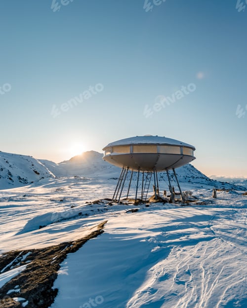 Preview: Vertical shot of a Polar Station in a beautiful mountainous area under the clear sky