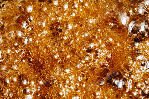 Preview: Preparation of sugar candies at home.A taste of our childhood.Background, sugar bubbles Texture