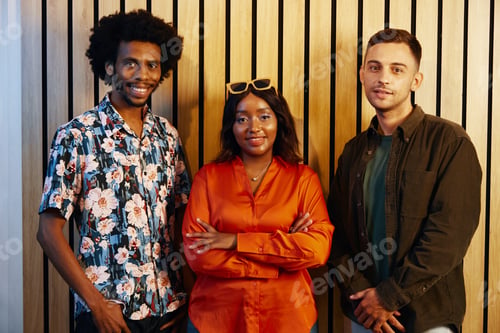 Preview: Multiethnic Music Band Posing At Camera