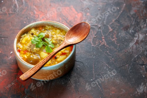Preview: front view tasty meat soup with potatoes and rice inside little plate on dark surface cuisine dish