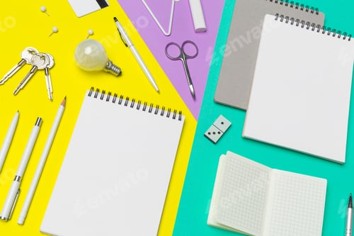 Preview: school supplies at colorful paper background