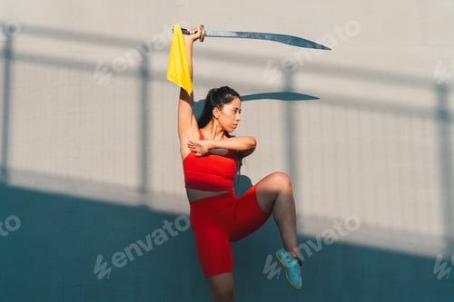 Preview: Chinese young woman practicing wushu kung fu.