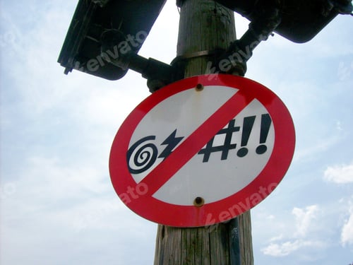 Preview: No Cursing sign on a city’s street post.