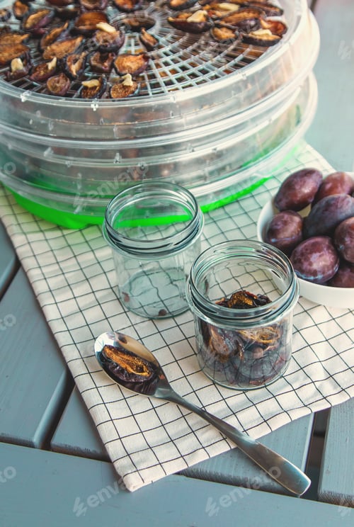 Preview: Plums dried in a dehydrator. Selective focus.