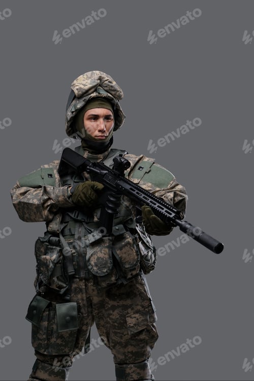 Preview: Modern Soldier holding a weapon against a grey backdrop