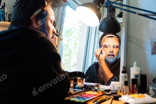Preview: Adult man dressing up as drag queen in studio