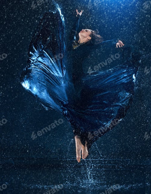 Preview: The young beautiful modern dancer dancing under water drops