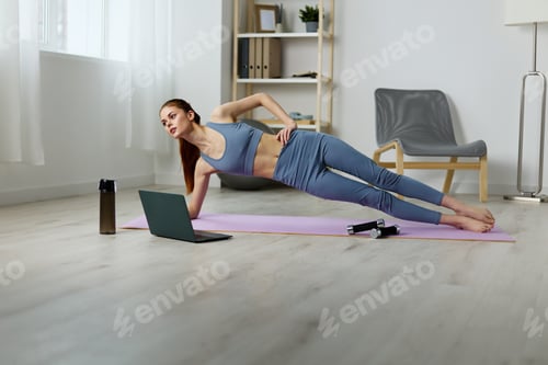 Preview: woman mat health laptop training lifestyle video fit home yoga lotus