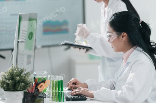 Preview: Medical research team conducting scientific experiments in a pharmaceutical laboratory