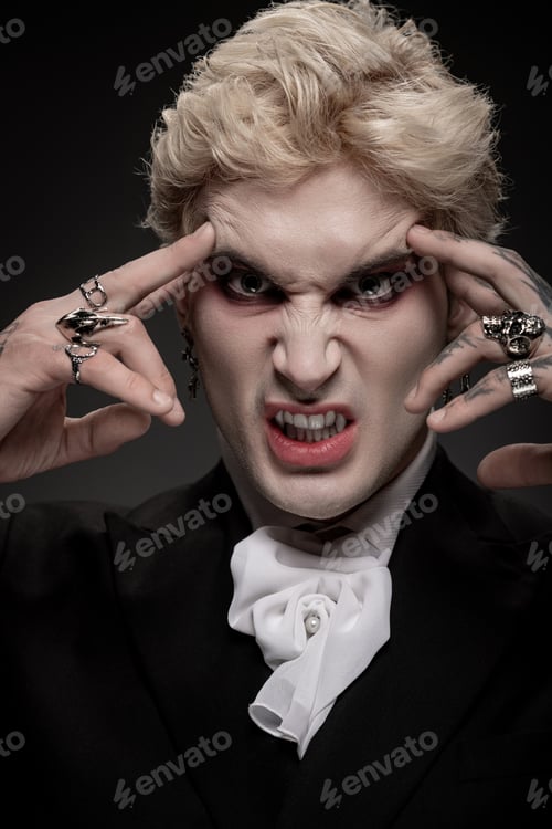 Preview: Young man showcases striking Halloween costume with intense expression