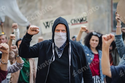 Preview: Police stopping group of people activists with raised fists protesting on streets, BLM.