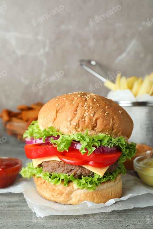 Preview: Tasty fast food on gray textured table