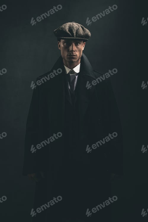 Preview: Threatening Retro 1920S English Gangster In Smoky Room.