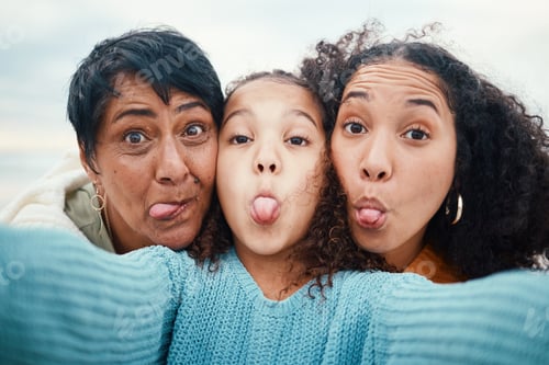 Preview: Funny, tongue out and portrait of a family selfie, silly and goofy at the beach in Bali. Comic, cra