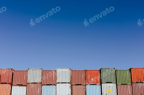 Preview: Stacks of multi coloured shipping containers.