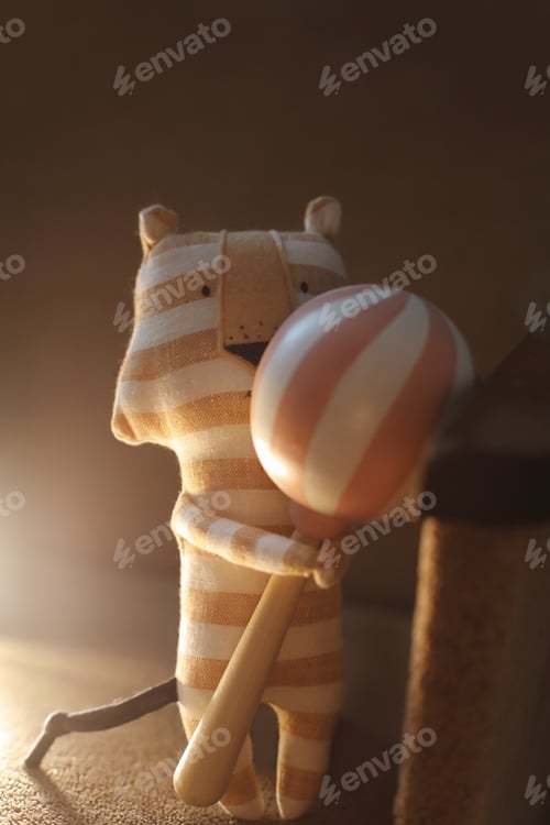 Preview: Toys made of natural materials. Tiger plush toy on cozy background. Non-plastic, eco-friendly