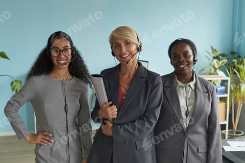 Preview: Portrait of Diverse Women Wearing Headsets Smiling in Office
