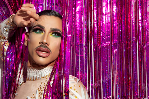 Preview: young man makeup drag queen performer with colorful background