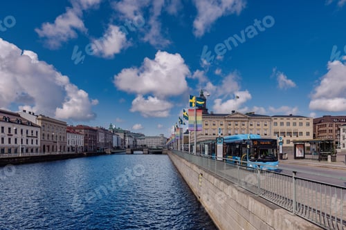 Preview: Scenic view of a canal with historic buildings and a bus in Gothenburg, Sweden.
